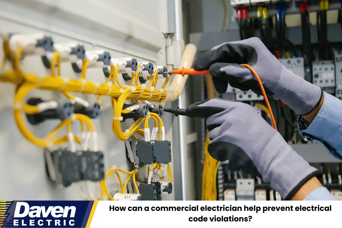 How can a commercial electrician help prevent electrical code violations?